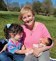 Lisa with her grandchildren