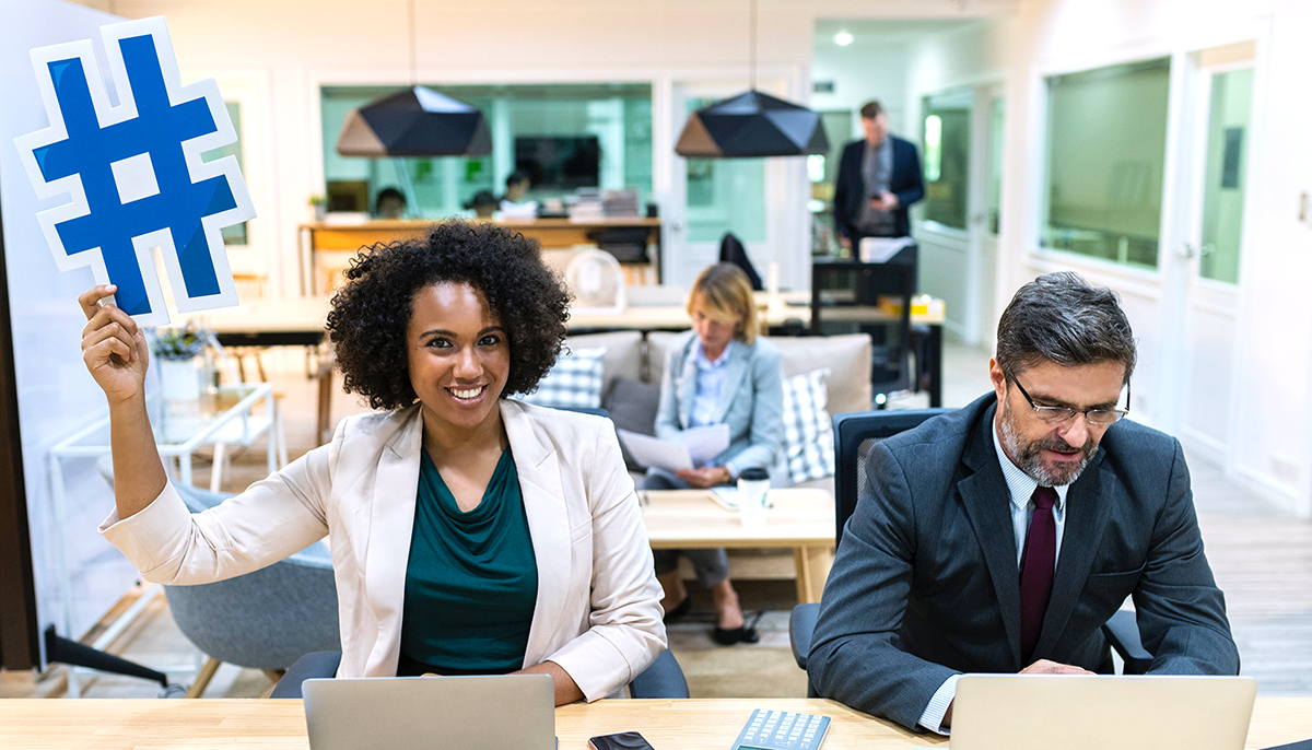 Woman with hashtag at office